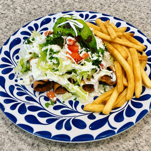 Taquitos Dorados W/ French Fries.